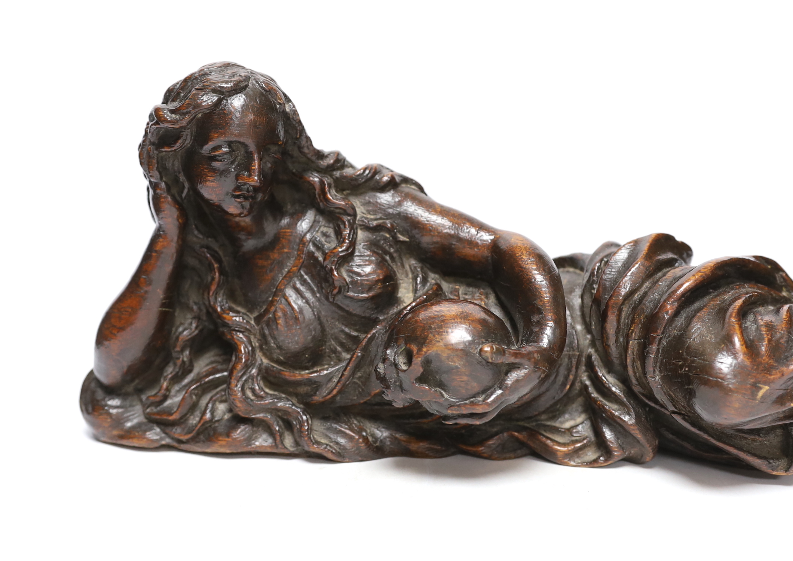 A 17th century carved oak figure of the penitent Mary Magdalene, possibly English, 52.5cm